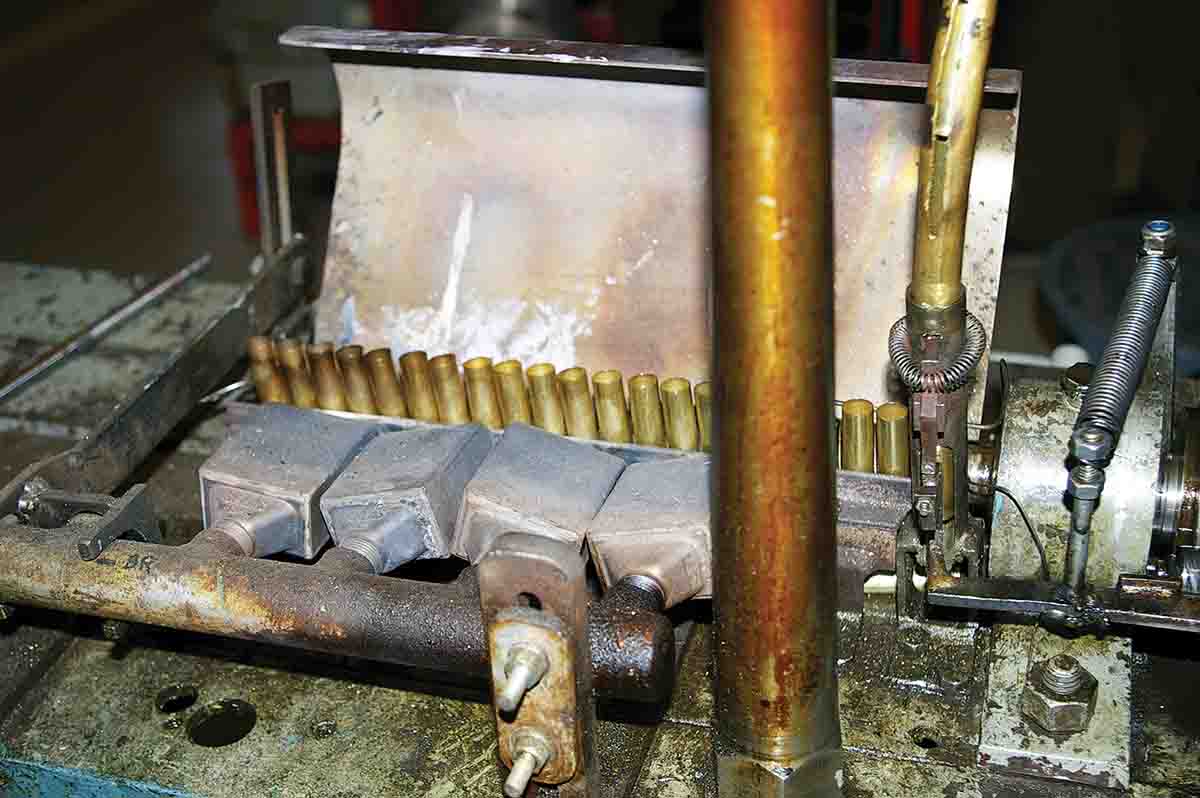 These partially formed cartridges are being annealed before they are formed into cases at the Norma Precision factory in Sweden.